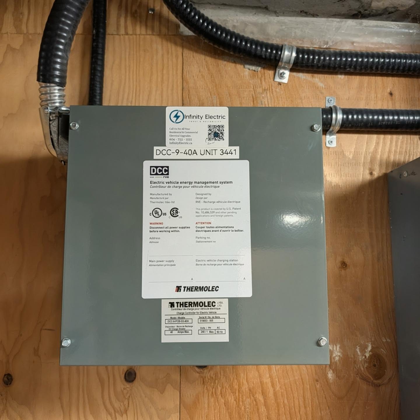 Closed DCC load-management enclosure and connected conduit